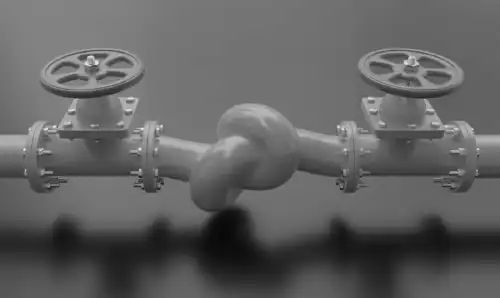 Visual metaphor for stalled pipeline . Water pipe with a knot.