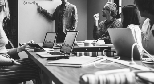 People in a planning meeting for strategic growth